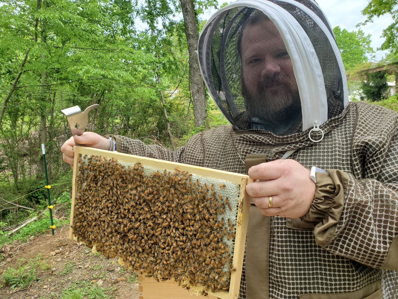 a happy beekeeper